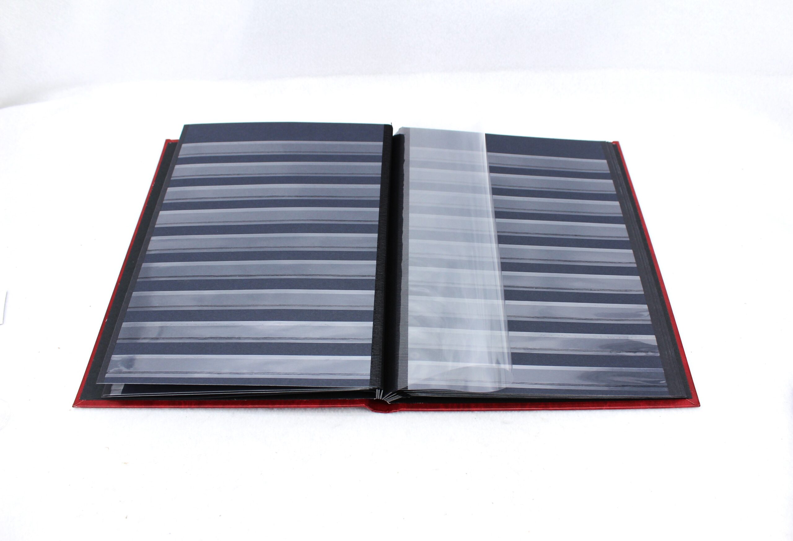 16 Page Red Hardcover Supersafe Stockbook W Black Pages &Amp; Clear Inter 1 stockbook w clear iternleave and strips